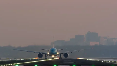 Passenger Jet Takeoff Head-On at Dusk Stock Footage 335023073