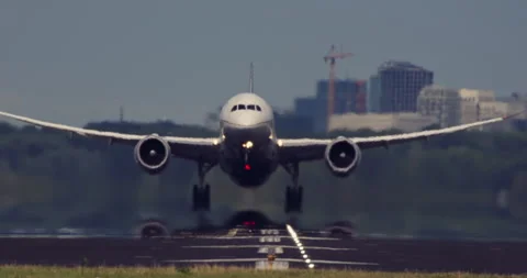 Passenger Jet Taking Off from Runway Stock-Footage 323875423
