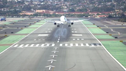 Passenger Jet Touching Down on Airfield. Stock Footage 321179942
