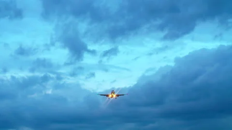 Passenger Jetliner Overhead. Sunset, Clouds. Stock Footage 90970752