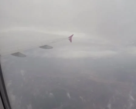 Passenger liner flying through clouds, airplane flight porthole, click for HD Stock Footage 43966829