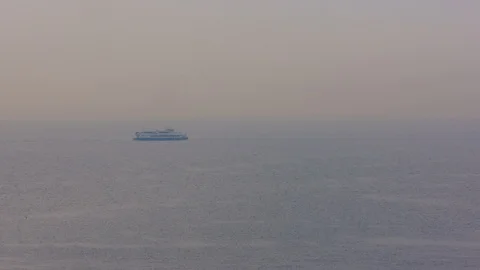 A passenger liner passing by Stock Footage 104178916