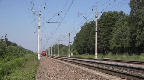 Passenger long-distance express train with electric locomotive Stock Footage 64961376