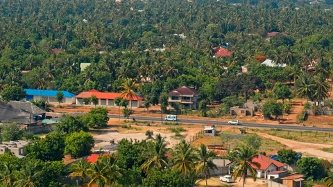 Passenger mini van driving on streets of Dar es Salaam in Tanzania Africa Stock Footage 73828489