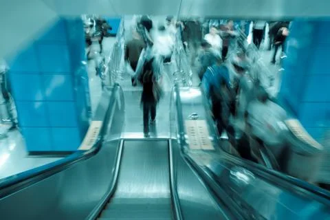 Passenger on moving escalator Foto stock