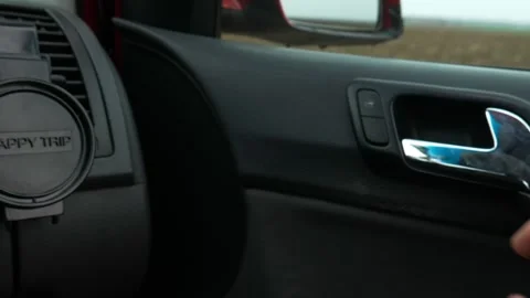 Passenger open the car door from the inside fast. Video stock 253708651