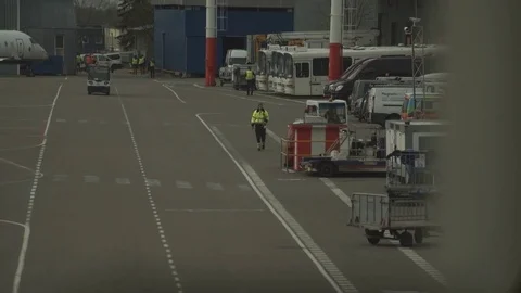 A passenger plane being serviced by ground services before next takeoff. Stock Footage 76202816