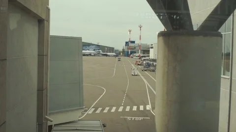 A passenger plane being serviced by ground services before next takeoff. Stock Footage 76204184