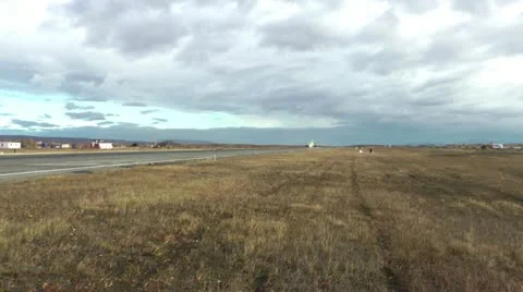 The passenger plane disperses on a runway for further take-off Stock Footage