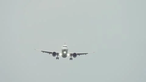 Passenger plane fighting crosswind during landing. Aircraft experiencing strong Stock Footage 318452932