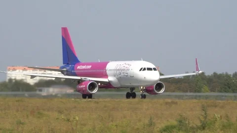Passenger plane fly up over take-off runway from airport. Kyiv, Ukraine 16.09 Stock Footage 118858701