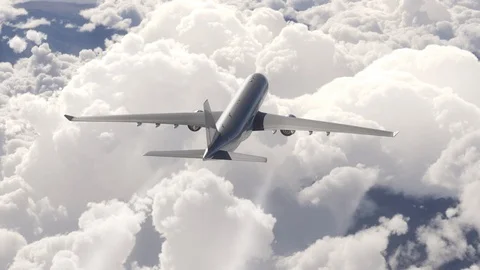 A passenger plane flying above the clouds Stock Footage 113143255