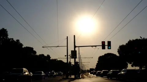 Passenger plane flying over a road Stock Footage 295493829