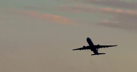 A passenger plane flying at sunset. Airspace security and safety 스톡 동영상 342562986