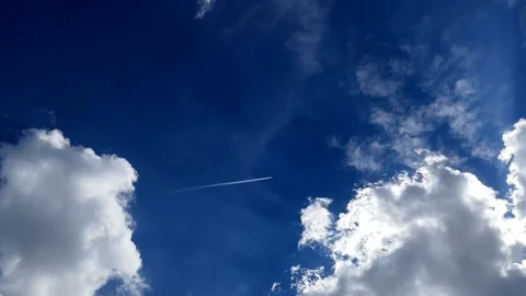 A passenger plane flying through the clouds, Vídeo Stock 104746646
