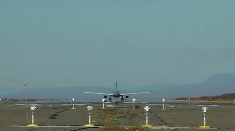 The passenger plane goes and glints in the sun the smooth fuselage Видео 23526426