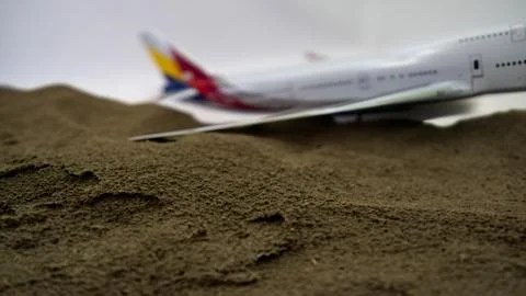 Passenger plane on map and plane crash - Stock Photos