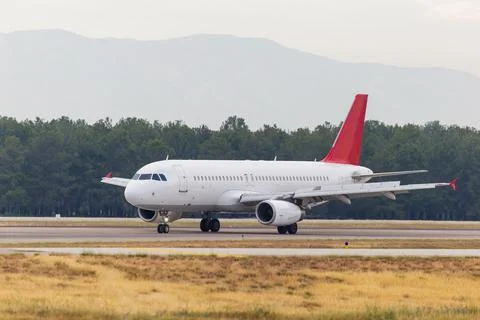 A passenger plane preparing for flight Photos