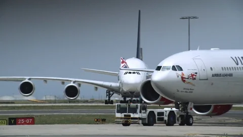 Passenger Plane Pulled Across Runway Video stock 94134536