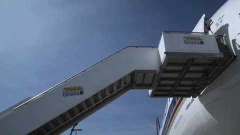 Passenger Plane on Runway - Camera Pans To Cockpit Video stock 94134373