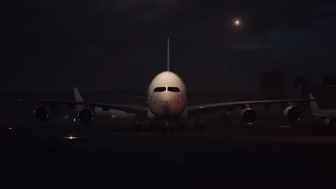 Passenger plane on the runway at night Video stock 282851400