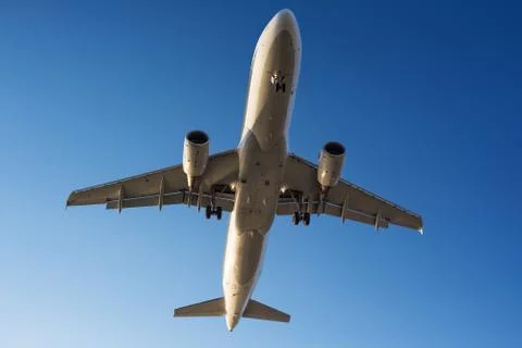 Passenger plane on the sky Stock Photos