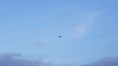 Passenger plane in the sky Stock Photos