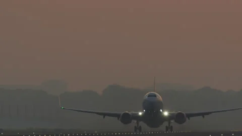 Passenger plane takeoff at dawn Stock-Footage 300617105