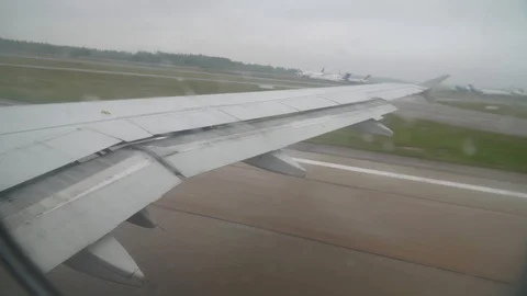 A passenger plane takes off in cloudy weather Stock Footage 101486233