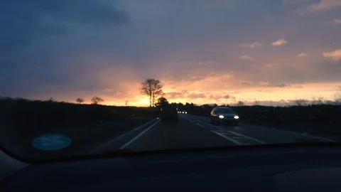 Passenger point of view in car sunset dusk Video stock 112043595