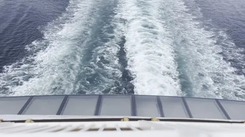 Passenger point of view from a ferry deck showing foaming water Stock Footage 340106427