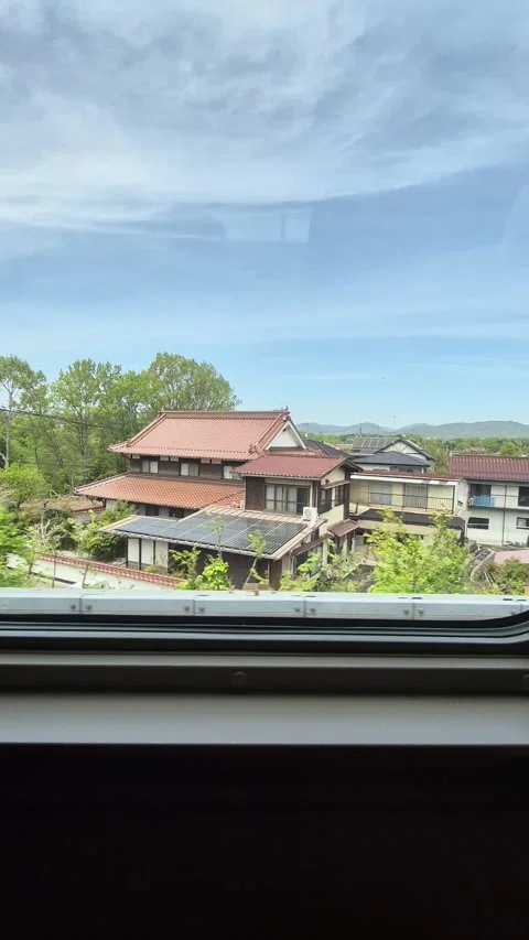 Passenger point of view from a Shinkansen window 스톡 동영상 338314433
