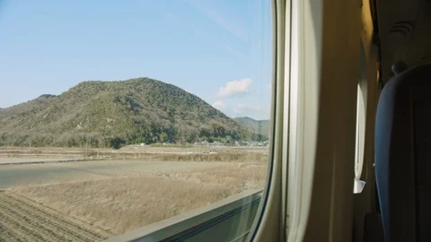 Passenger POV looking out from a high speed bullet train, Japan Stock-Footage 125601894