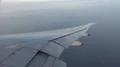 Passenger POV out of wing Boeing 777-300 window seat descent landing flaps 4k or 4k+ Resolution