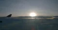 Passenger POV sunset out of wing Airbus A330-300 window seat 4k or 4k+ Resolution