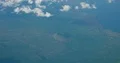 Passenger POV volcano landscape out of Boeing 737-500 window seat 4k or 4k+ Resolution