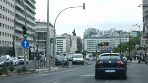 Passenger POV zig-zagging busy urban street in Lisbon, Portugal Stock Footage 116343315