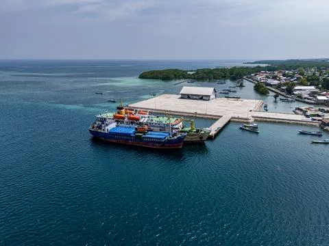 The Passenger Ship and Cargo Ship are docking at Waingapu Port Stock Photos
