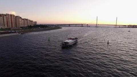 Passenger ship in a city river Stock Footage