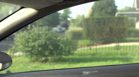 Passenger side car window broken into Stock Footage