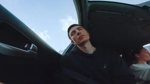 The passenger sleeps in the car Stock Footage 298839212