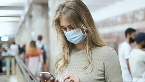Passenger subway masks type message phone corona virus. Girl use mobile covid-19 Stock Footage 142402473