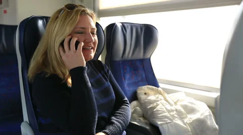 Passenger talking phone in train Video stock 34812652