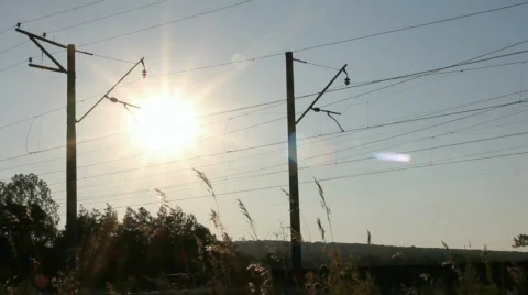 Passenger train against sunset Stock Footage