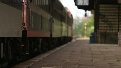 Passenger train arrival to a station Stock Footage 11880669