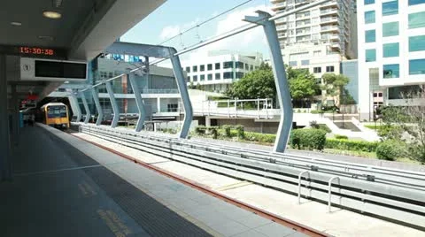 Passenger train ﻿in arrive at the station in Melbourne Stock Footage 12468372