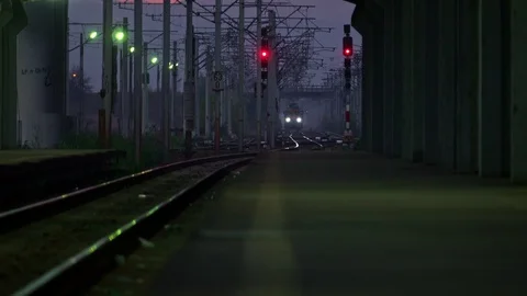 Passenger train arriving in the station Stock Footage 98535706