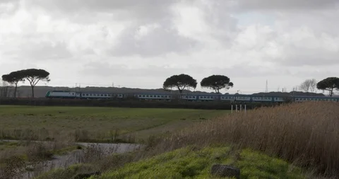 Passenger train in the countryside Stock Footage 87119386