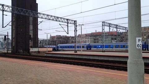 Passenger train departs from the railway station. Stock Footage 257352753