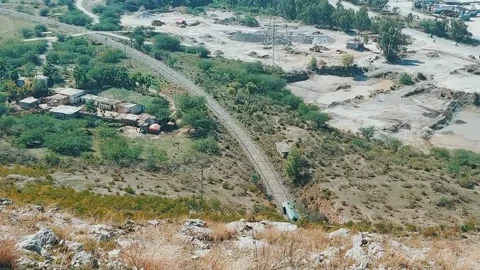 Passenger Train Emerging from the Historic Margalla Hills Tunnel Stock Footage 333542917